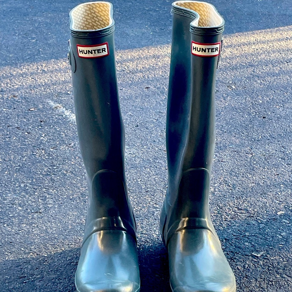 Hunter rain boots.